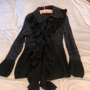 Melanie Lyne Sweater,  Black, long sleeves, high low length, L.